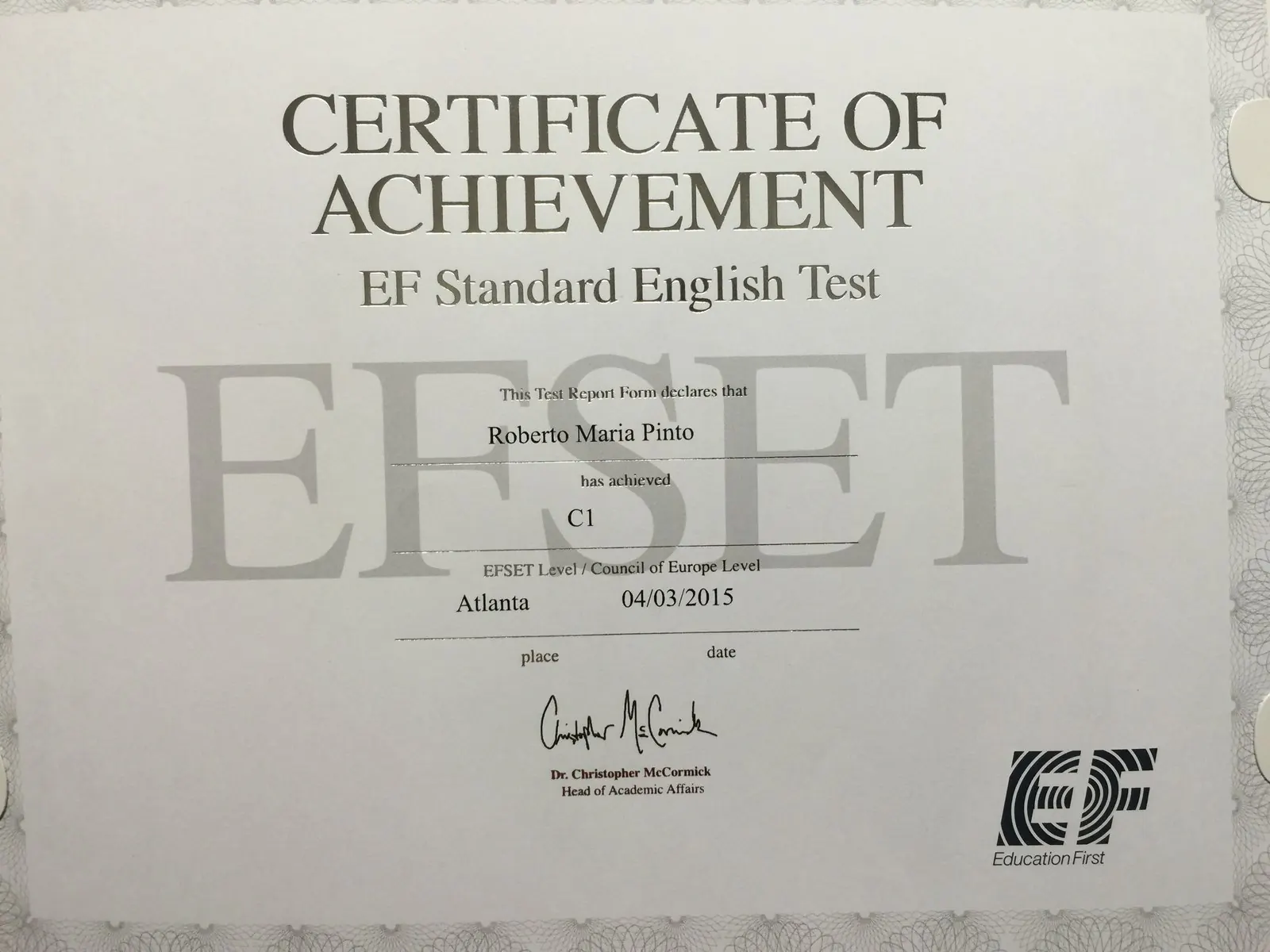Certificado EF Standard English Test nivel C1 de inglés de negocios a nombre de Roberto Pinto, Atlanta, 2015